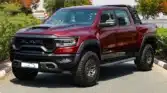 2024 RAM 1500 TRX Delmonico Red Final Edition BEAD LOCK BEDCOVER RAMBAR.jpg