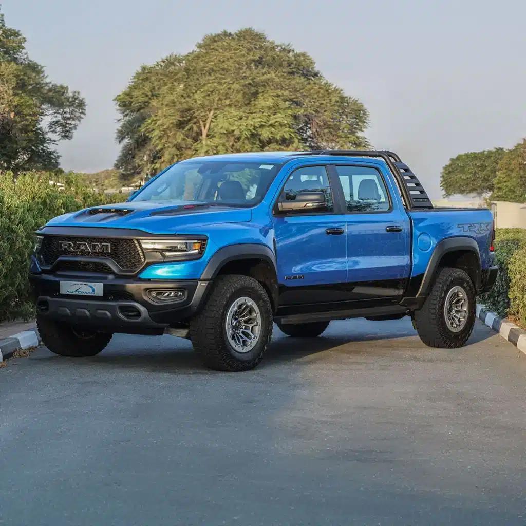 2024 RAM 1500 TRX Hydro Blue BEAD LOCK RAMBAR Tire Carrier.jpg